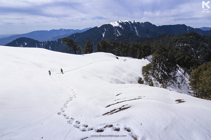Trekking Through Snow to visit the Temple enroute Serolsar Lake at Jalori Pass